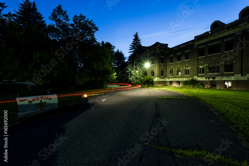 Abandoned Nursing Home at Sunset / Blue Hour / Dusk with Police Car