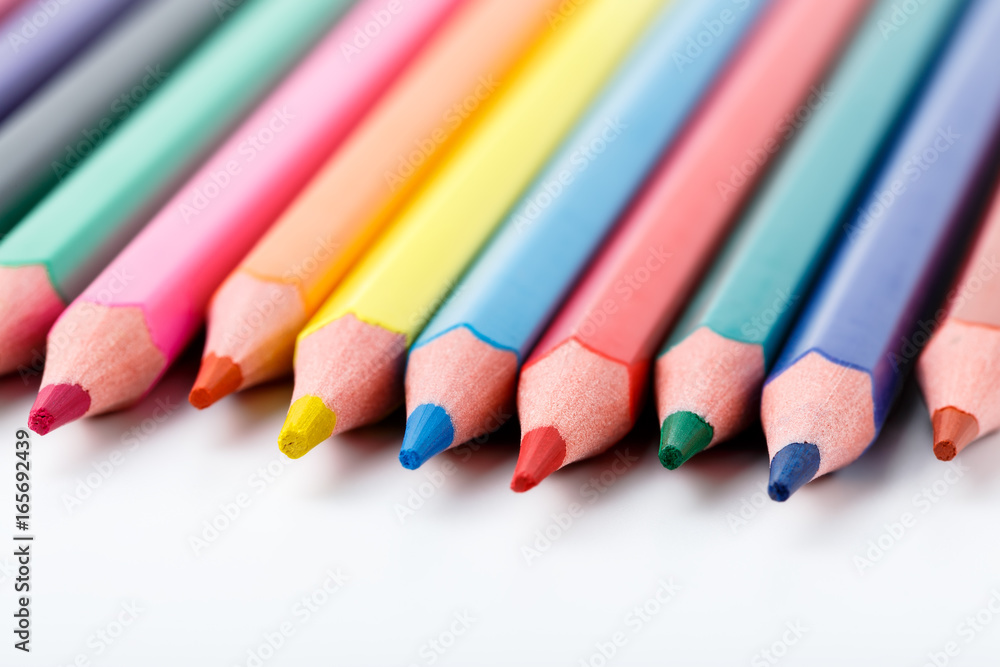 Color pencils isolated on white background. Many different colored pencils. Colored drawing pencils in a variety of colors Color pencils isolated on white background. Many different colored pencils. Colored drawing pencils in a variety of colors