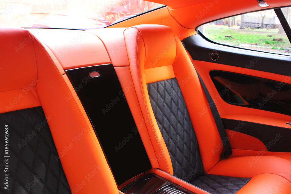 luxury car seat. Orange car interior. luxury car Car Stock Photo