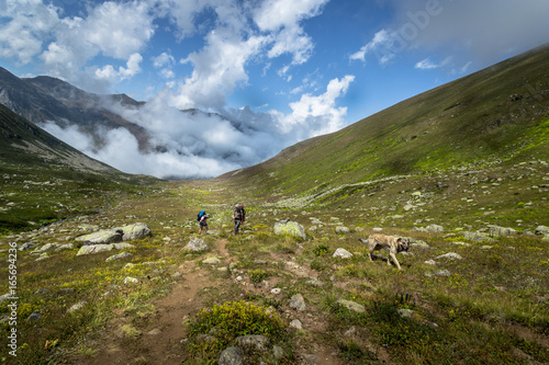 TURKEY, Rize, August 18, 2015: Two unidentified hikers with large backpacks hiking on mountain Kackarlar. Kackar Mountains are a mountain range that rises above the Black Sea coast in eastern Turkey