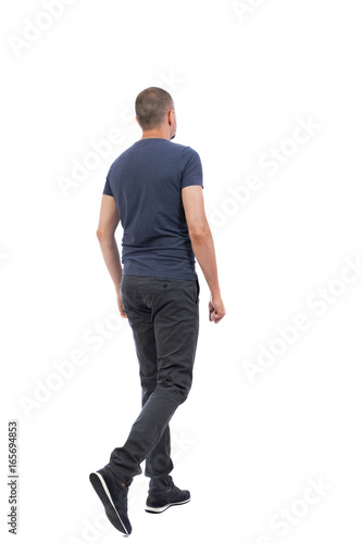 Back view of going  handsome man. walking young guy . Rear view people collection.  backside view of person.  Isolated over white background.