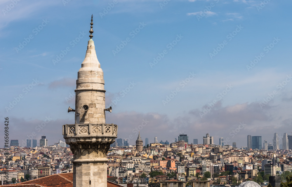 Fototapeta premium ISTANBUL, TURKEY - MAY 05, 2017:View of galata tower from roof of Buyuk Valide Han an old Ottoman inn that accommodated traveling merchants over 350 years ago