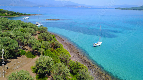 Aerial drone photo of Monolia island exotic beach with sapphire and turquoise clear waters, called the 