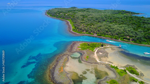 Aerial drone photo of exotic beaches with sapphire and turquoise clear waters, called the "Seychelles" of Greece, Lihadonisia island complex, North Evoia gulf, Greece