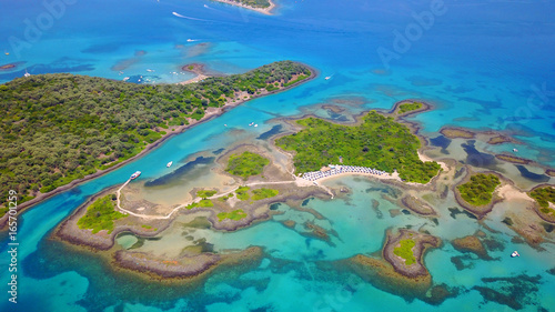 Aerial drone photo of exotic beaches with sapphire and turquoise clear waters, called the "Seychelles" of Greece, Lihadonisia island complex, North Evoia gulf, Greece