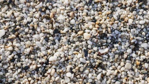 Sea beach close-up - small pebbles textured background