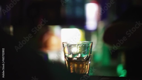 Baman making cocktail in night club photo