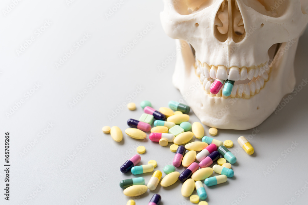 Naklejka premium Skull model, Pharmaceutical Drugs and Heart health for education in laboratory.