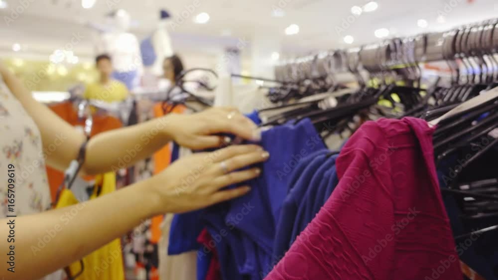 woman shopping in cloth shop close up shot woman shopping in cloth shop close up shot
