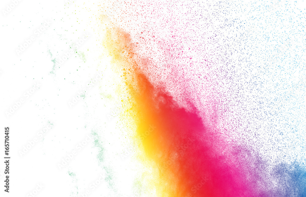The explosion of colored powder. Beautiful powder fly away. The cloud of glowing color powder on white background