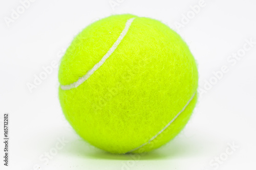 Tennis ball on white background. © pipatc