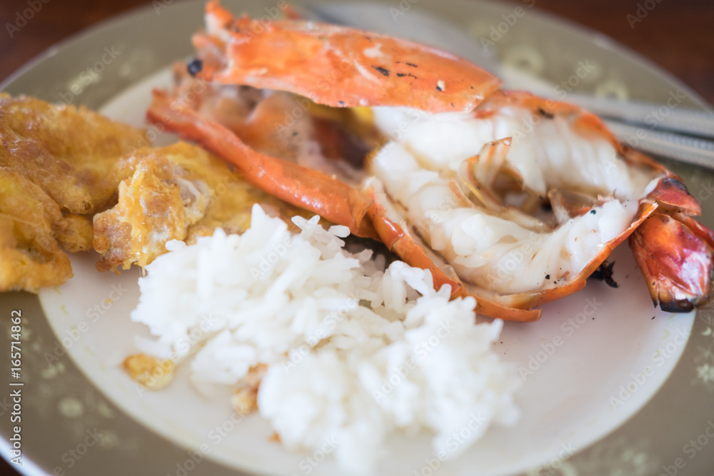 Thai Jasmine rice eating with shrimp and omelet Thai Jasmine rice eating with shrimp and omelet