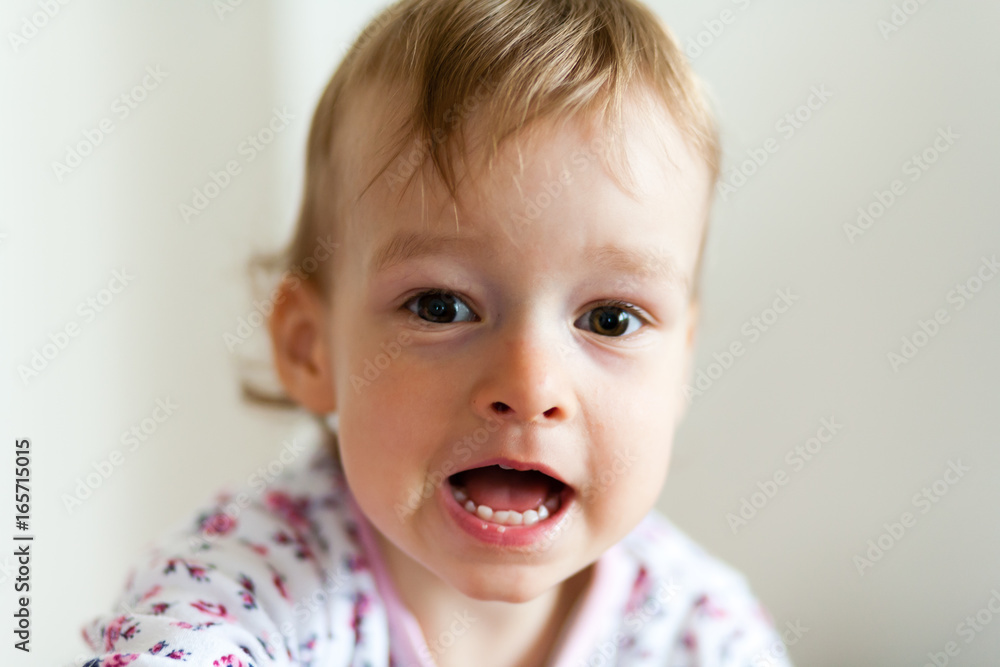 2 years old girl child is doing facial expressions 2 years old girl child is doing facial expressions
