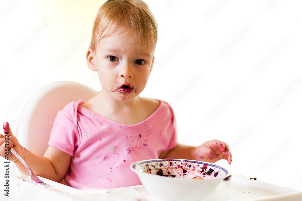 2 years old girl child is eating 2 years old girl child is eating