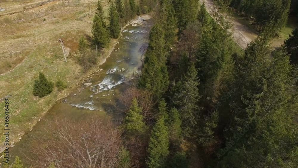 Aerial View. Flying over the beautiful mountain River and forest Aerial View. Flying over the beautiful mountain River and forest