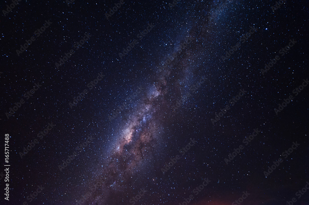 Starry night sky with milky way. Image contain visible noise due to high iso. soft focus due to wide aperture and long expose.