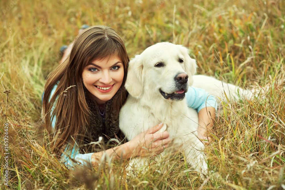 Labrador retriever with owner Labrador retriever with owner