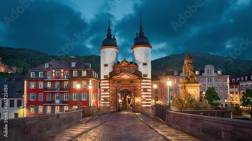 Illuminated Old Bridge Gate on Karl Theodor Bridge in Heidelberg, Baden-Wurttemberg, Germany
