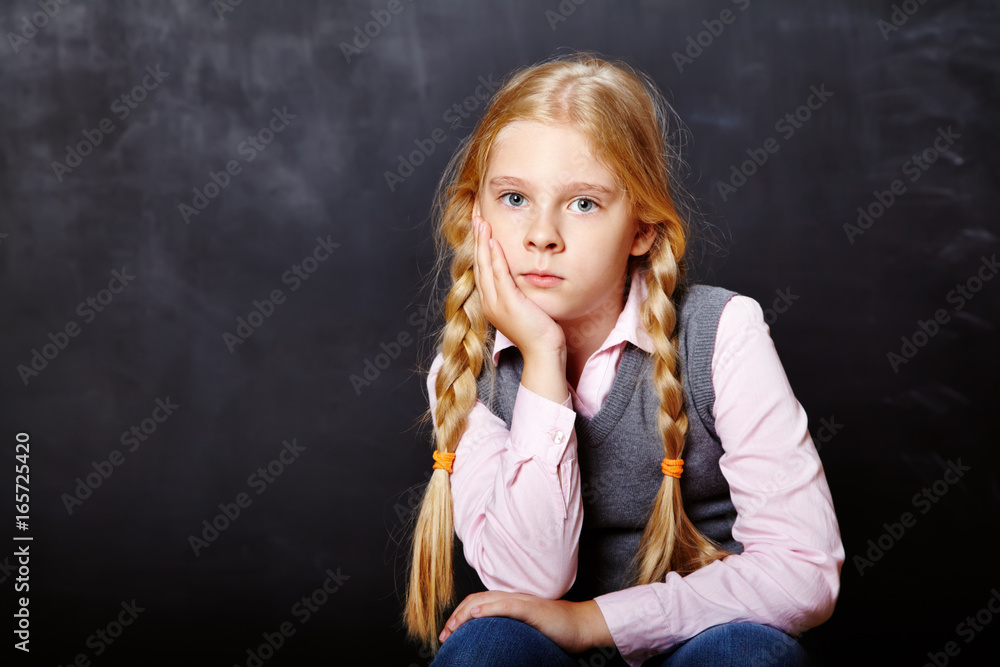 schoolchild on blackboard background schoolchild on blackboard background