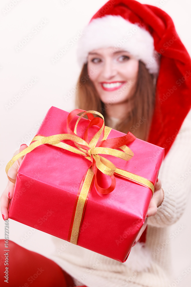 Woman holding gift box. Christmas time Woman holding gift box. Christmas time