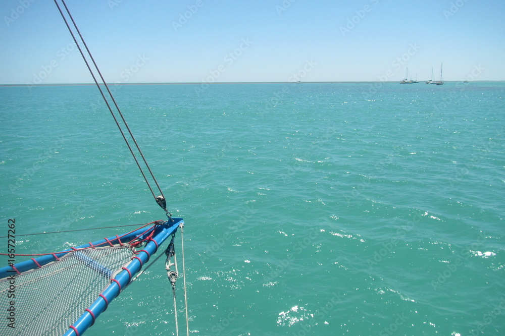 Fotografie Blue Sea and Boat