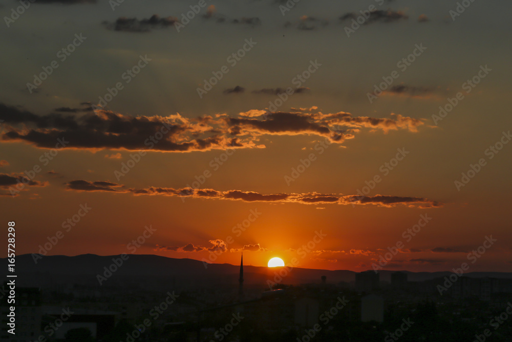 Sunset over Ankara Turkey skies. beautiful landscape with a red sunset sky over the field Sunset over Ankara Turkey skies. beautiful landscape with a red sunset sky over the field