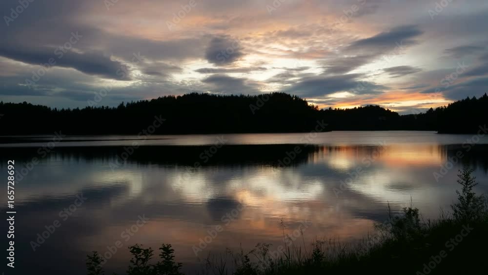 Norwegian Lake at Sunset Timelapse. Scandinavian Landscape in 4K UltraHD. Norwegian Lake at Sunset Timelapse. Scandinavian Landscape in 4K UltraHD.