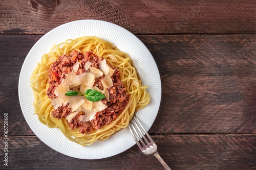 Pasta bolognese on rustic background with copyspace