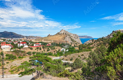 View of the resort town of Sudak on the coast of the Black sea from Genoese fortress on the mountain Cenevez Qaya