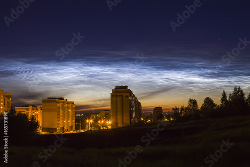 Noctilucent clouds in the night sky