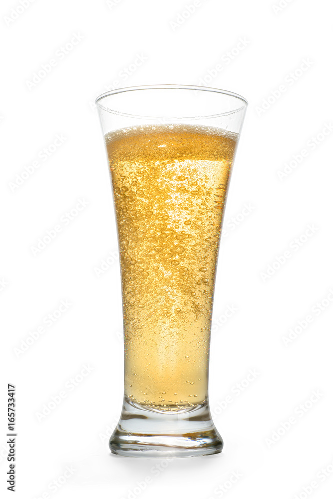 Golden sparkling drink into high glass Golden sparkling drink into high glass