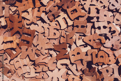 Fotografie Pile of wooden cyrillic letters alphabet