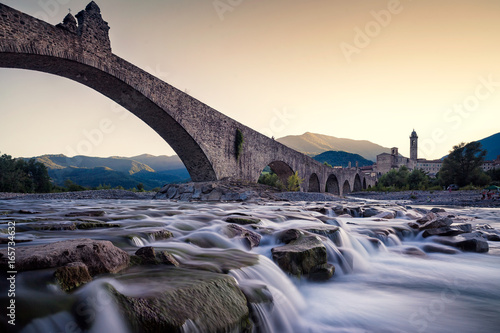 Photos View of the old medieval bridge, called Ponte del Diavolo or Ponte Gobbo ove