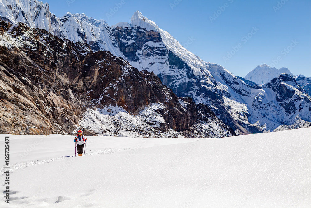 Hiking Woman Crossing Cho La Pass in Himalaya Mountain s, Nepal
