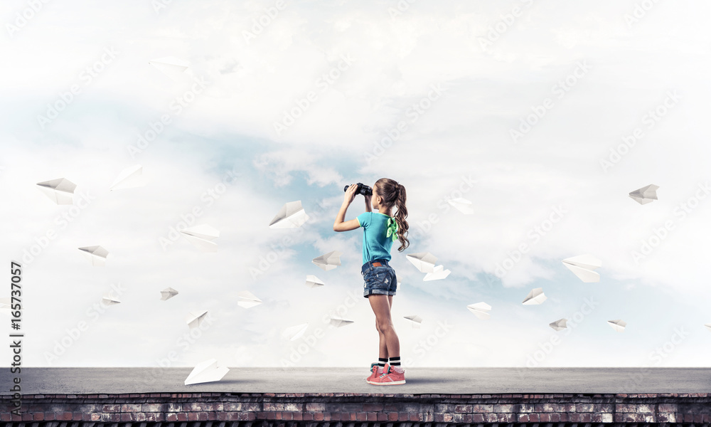 Concept of careless happy childhood with girl of school age look Concept of careless happy childhood with girl of school age look