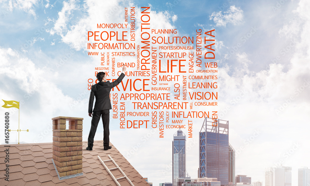 Young businessman standing on house roof and writing leadership skill concept. Mixed media Young businessman standing on house roof and writing leadership skill concept. Mixed media