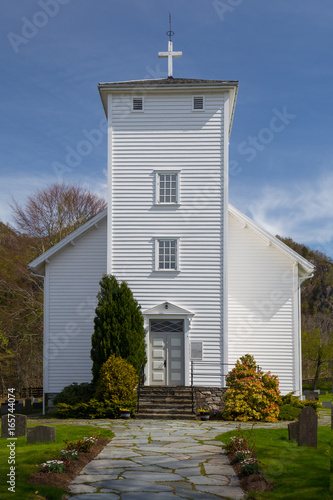 White painted wooden church in Hjelmeland, Norway