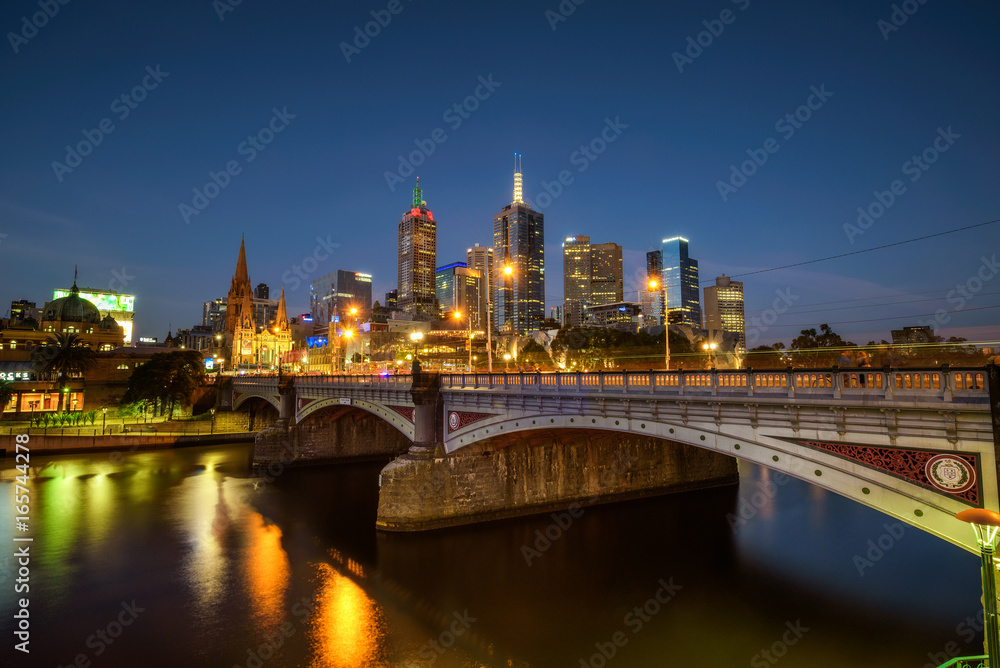 Skyline of Melbourne downtown, Princess Bridge and Yarra River at night