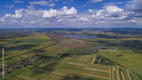 aerial view agriculture field summer day. Summer day landscape.
