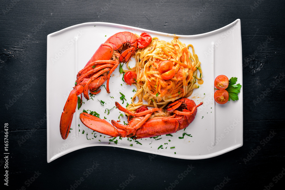 Omar boiled in spices and seafood pastes. On a wooden background. Top view. Free space for your text. Omar boiled in spices and seafood pastes. On a wooden background. Top view. Free space for your text.