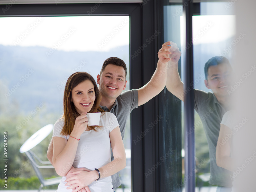 young couple enjoying morning coffee young couple enjoying morning coffee