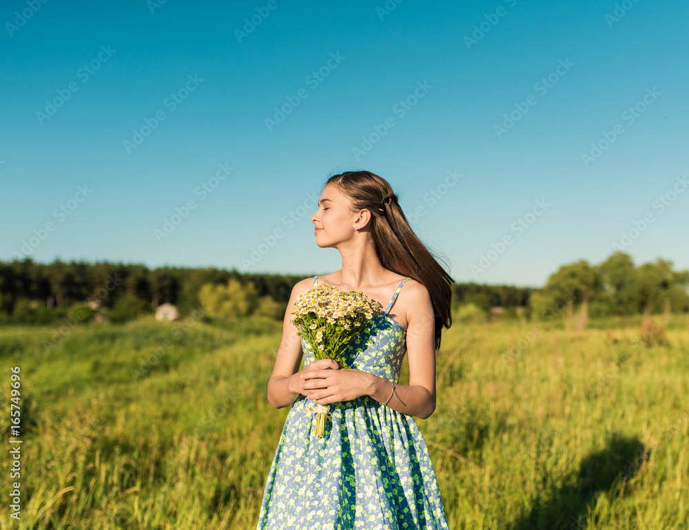 Beauty Girl outdoors enjoying summer nature. Beauty Girl outdoors enjoying summer nature.