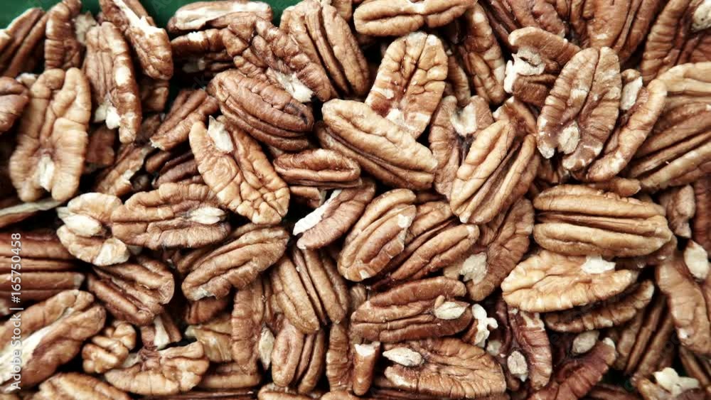 Food background. Pecan nuts close up. Dieting concept. Dolly slider shot 4K ProRes HQ codec