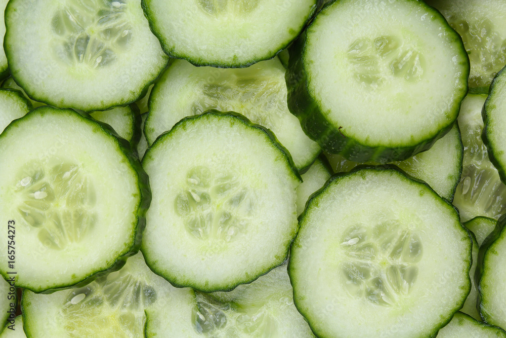 Cucumber slices closeup texture studio photo. Cucumber slices closeup texture studio photo.