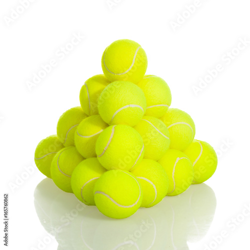 Pile of Tennis Balls sport equipment on white background with clipping path © Jenov Jenovallen