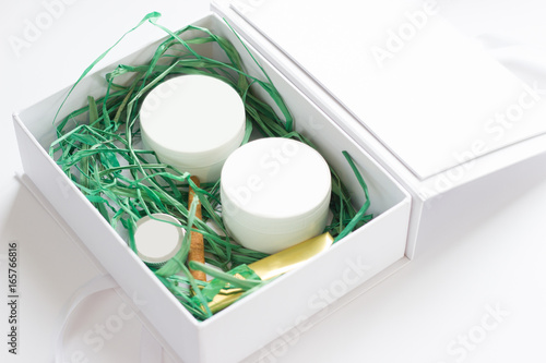 Beautiful decorative set of natural cosmetics for spa. Decorative gift boxes with natural cosmetics and decorations