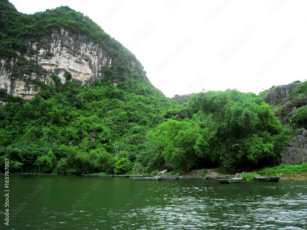 Landscape with boat, moutain and river, Trang An, Ninh Binh, Vietnam