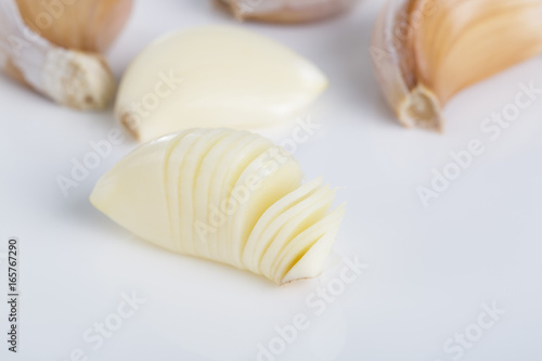 Closeup of garlic on the white background.