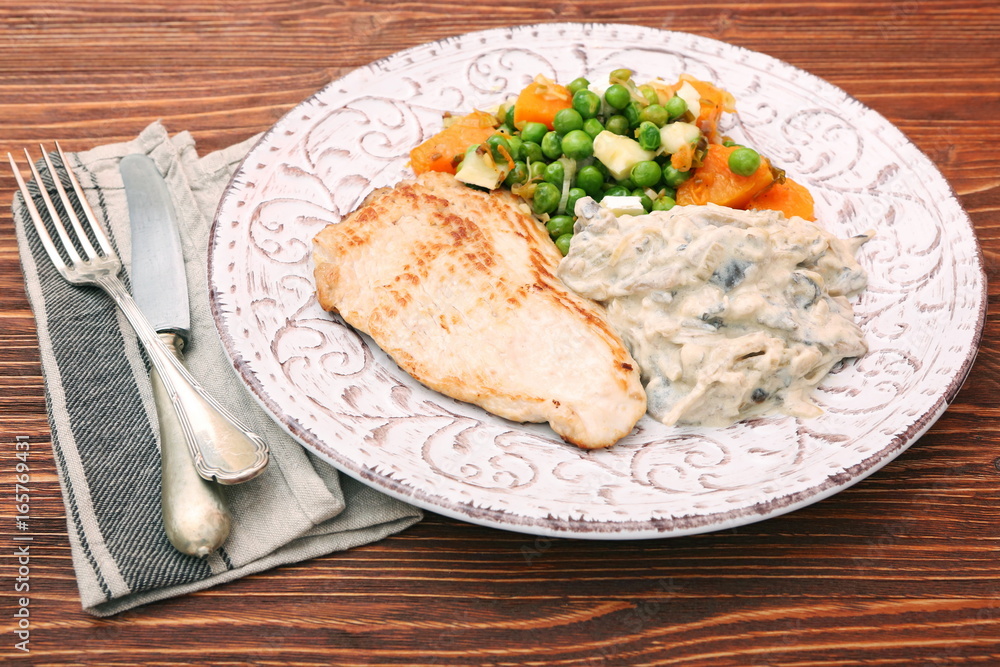 Turkey fillet with mushrooms in cream sauce and vegetables Turkey fillet with mushrooms in cream sauce and vegetables
