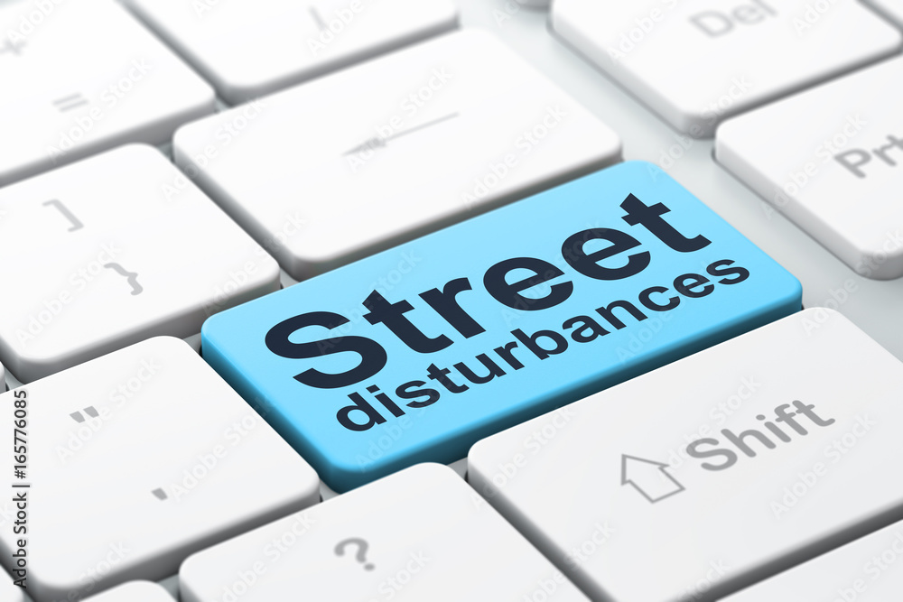 Political concept: Street Disturbances on computer keyboard background Political concept: Street Disturbances on computer keyboard background